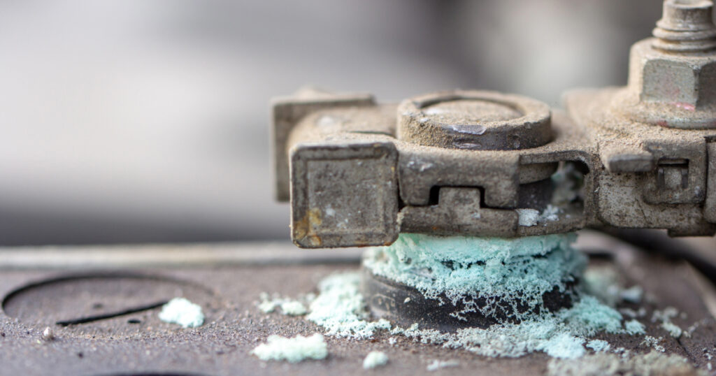 Close up picture of eroded battery terminals.